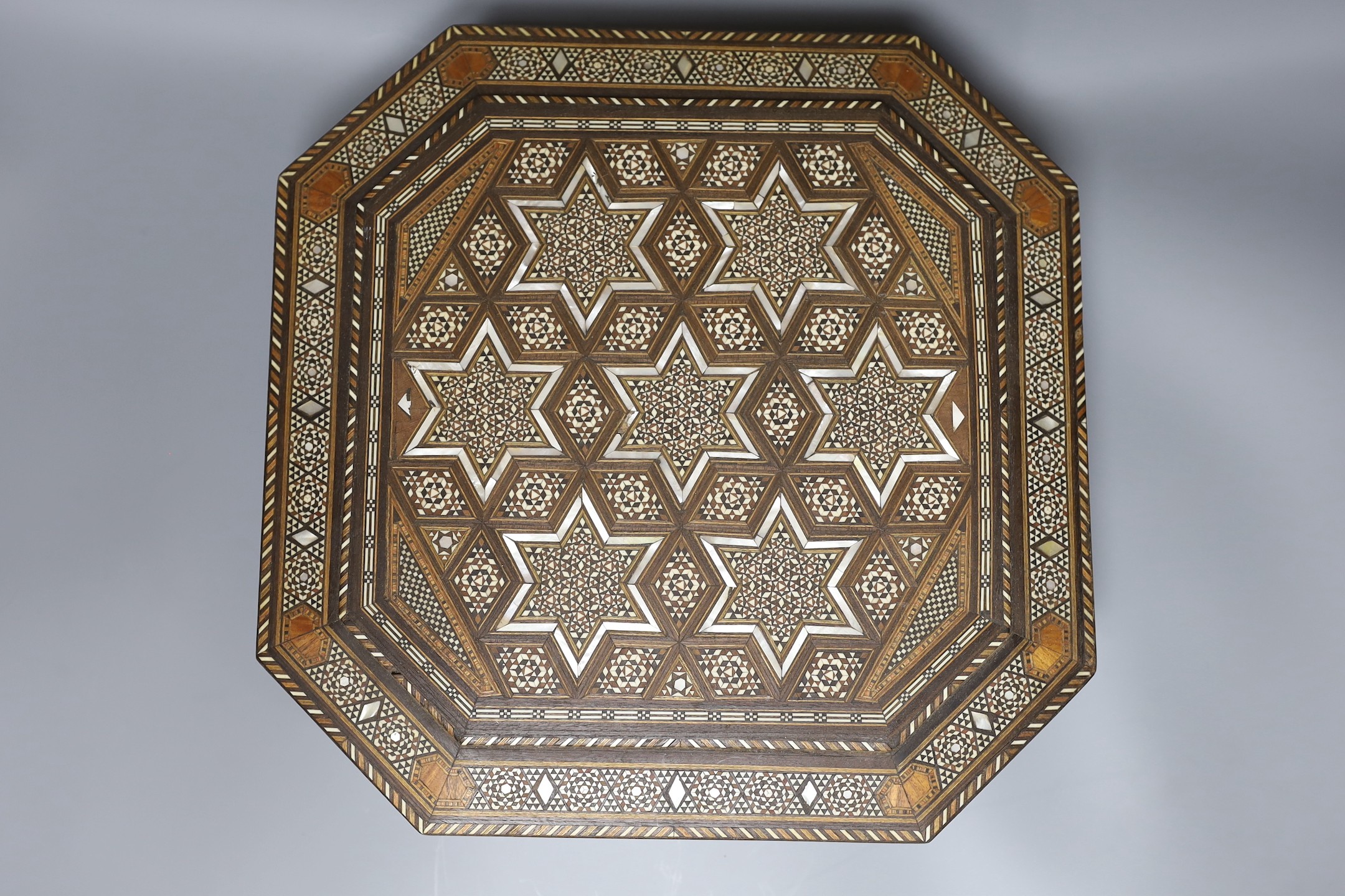 A Moroccan inlaid bone and mother of pearl hexagonal casket, 33 x 33cm